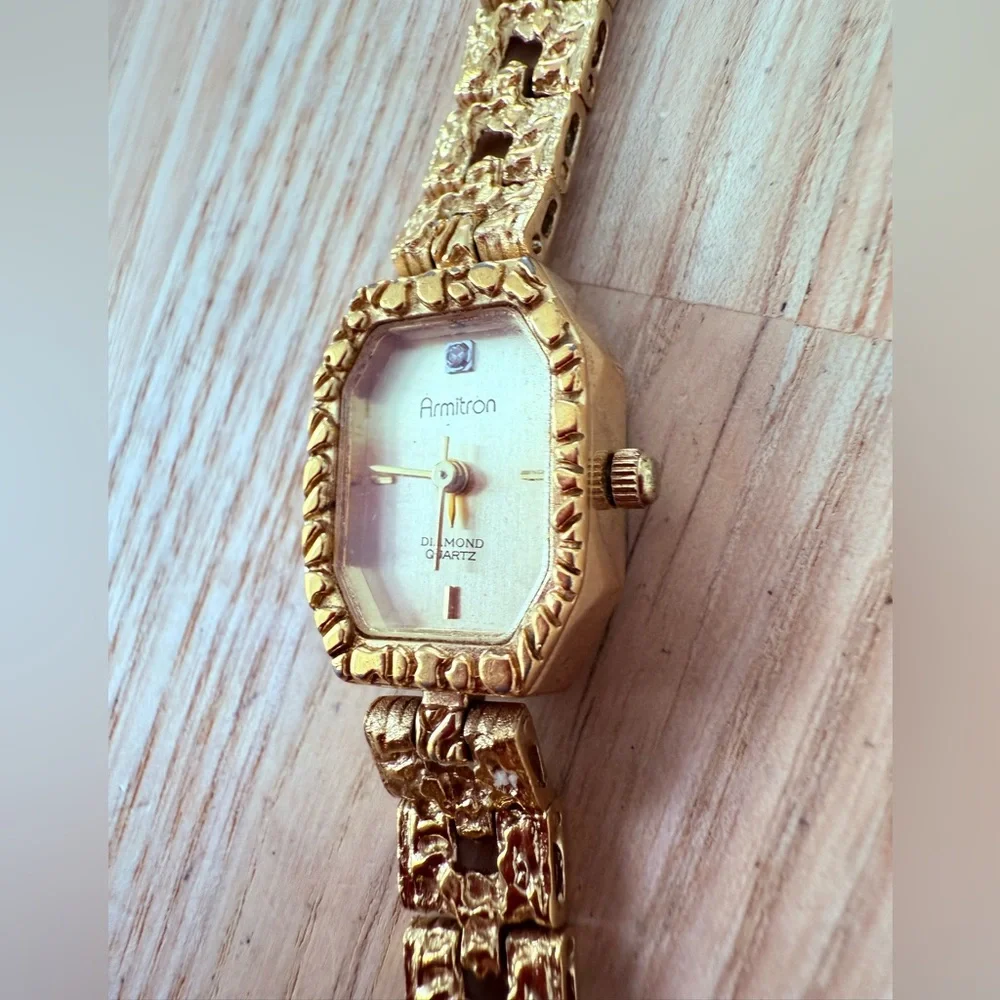Armitron ladies octagonal gold tone diamond dress watch NEW BATTERY